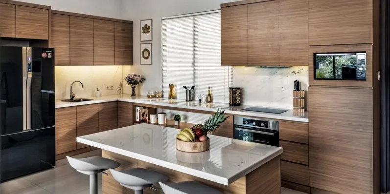 Desain dapur minimalis modern dengan palet warna netral dan perabot multifungsi.